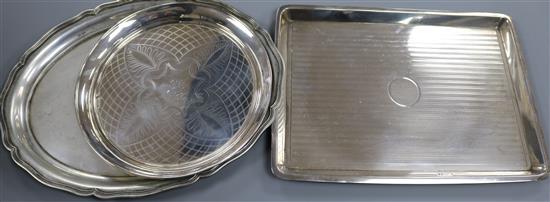 A George V silver dressing table tray, a 1920s silver salver and an 800 oval dish. 34.5 oz.